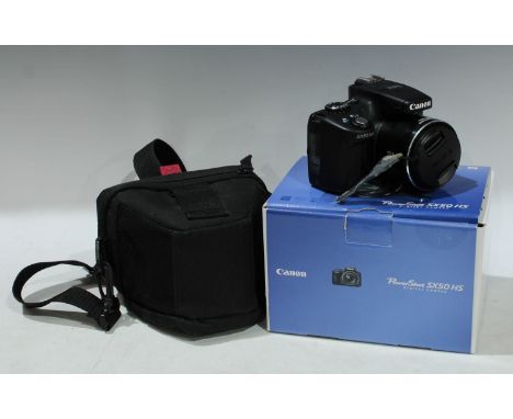 Cameras - a Canon Powershot SX50HS digital camera, boxed with charger and instruction manual; a Hama camera case (2) 