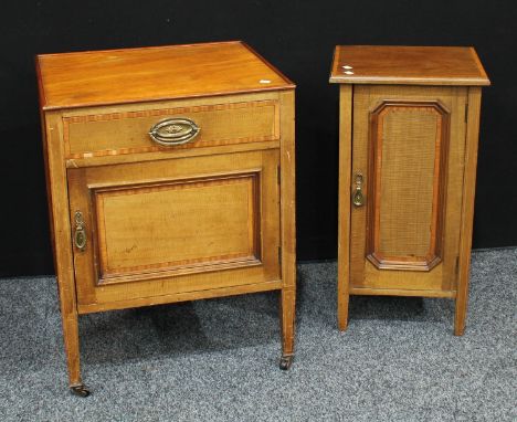 A mid 20th century mahogany bedside cabinet, rectangular top outlined throughout with ebony and boxwood stringing, panel door