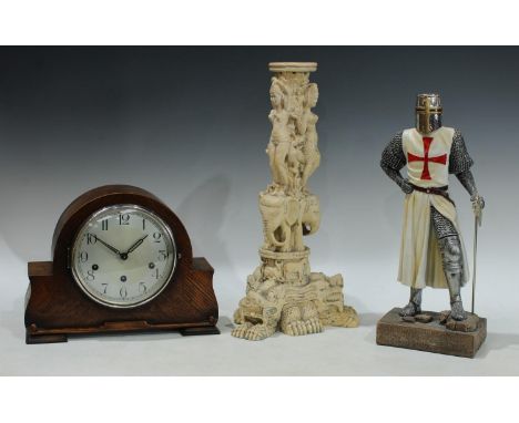 An oak mantel clock; a resin model of a crusaider, 38cm; a moulded rersin Indian style stand, 42cm (3) 