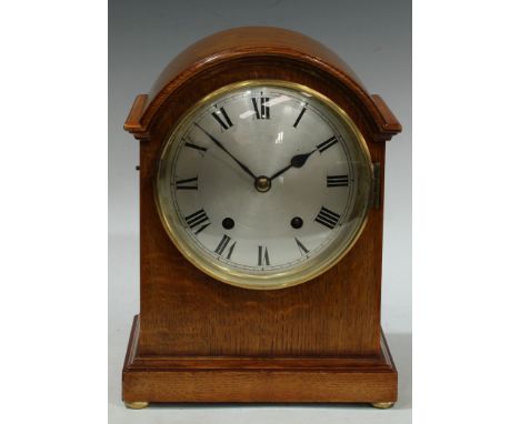 A George III style light oak mantel clock, arched case, silvered dial, Roman numerals, eight day movement, striking on a bell