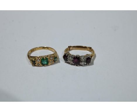 An 18ct gold and platinum diamond and ruby ring, 4.1g; an 18ct gold diamond and emerald ring, 3g (2) 