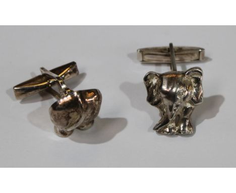 A pair of novelty silver cufflinks cast as the trunk and rear of an elephant, marked .925 