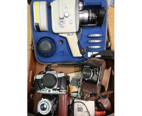 Cased Agfo Movex Reflex City camera with various accessories, a Praktica MTL50, a Voigtlander folding camera and various othe