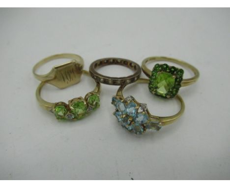 9ct gold Halo style peridot ring Size R, gross 2.8g and a 9ct gold aquamarine ring Size S gross 2.1g and a 9ct gold 3 stone p