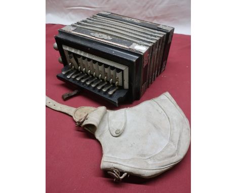 A vintage squeeze box and a vintage Stagg Gloves white leather flying helmet 