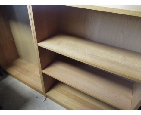 Pair of light oak finish tier bookcases, W81cm D32cm H104cm (2) 