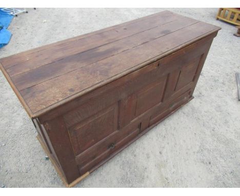 Large Geo.III oak chest with planked top and three panelled front above two drawers W148cm D55cm H80cm