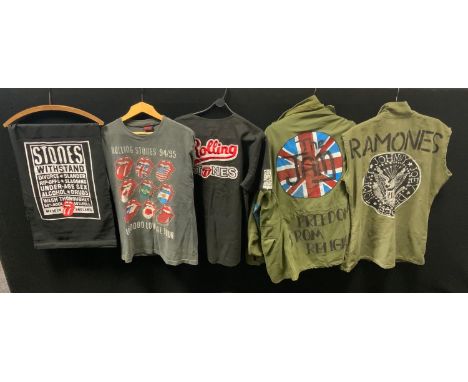 Music and fashion memorabilia - an American green parka jacket; The Jam painted details; The Ramones waistcoat; The Rolling S