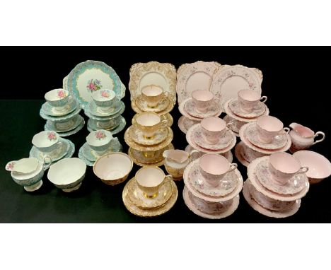 A Royal Albert Enchantment pattern part tea service comprising sandwich plate, side plates, teacups &amp; saucers, milk jug &