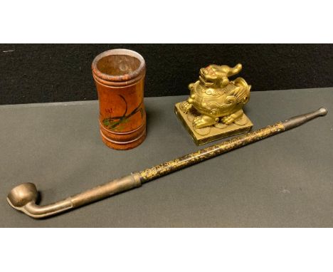 An early 20th century telescopic opium pipe, floral gilt decorated barrel; dice shaker, etc 