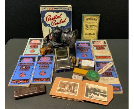 A multi tone whistle; a vintage black painted bicycle lamp; Sol-Vol advertising tin; magic lantern slides; Uno pen; cigar cut