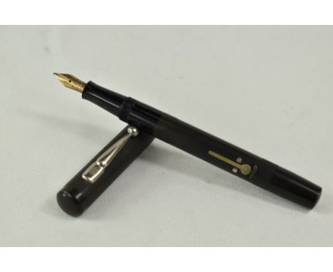 A Conway Stewart 479 lever fill fountain pen in black  with engine turned decoration having Conway Stewart 14ct nib. Approx 1