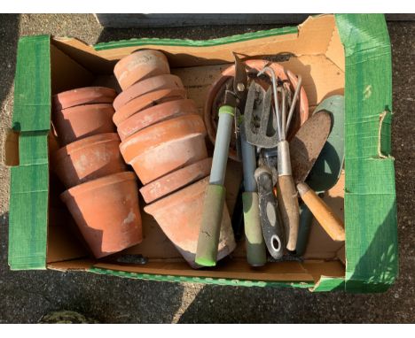 Terracotta Pots and Garden Tools 