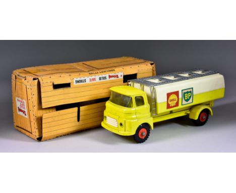 A Tri-Ang Tin Plate and Plastic Oil Tanker, with yellow cab and Shell and BP decals, 10.75ins long, boxed