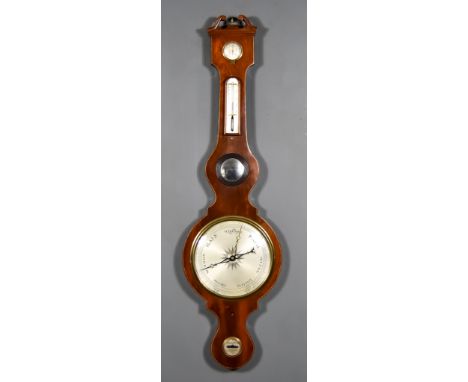 A George III Mahogany Cased Wheel Barometer and Hydrometer with 9ins silvered dial and alcohol thermometer contained in case 