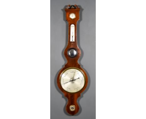 A George III Mahogany Cased Wheel Barometer and Hydrometer with 9ins silvered dial and alcohol thermometer contained in case 