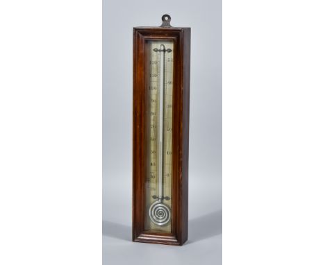 An English Mahogany-Cased Wall Thermometer, 20th Century, with 14.25ins silvered scale and mercury filled tube, 16ins