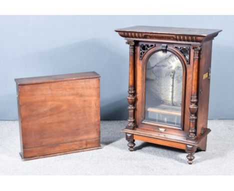 A 19th Century Walnut Cased "Penny in the Slot" Polyphone retailed by Douglas &amp; Co, South Street, Moorgates, London E.C. 