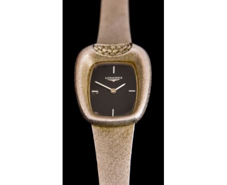 A Lady's Manual Wind Wristwatch, by Longines, frosted 18ct white gold case, 25mm x 28mm,&nbsp;black dial with white baton num