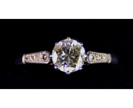 A Platinum Diamond Ring, set with a solitaire diamond, approximately 1ct, flanked by smaller white stones, size P+, gross wei