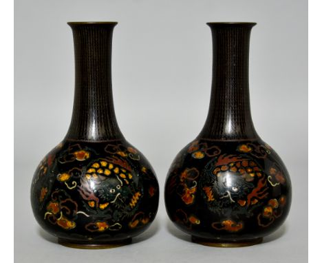 A Pair of Chinese Cloisonne Vases, 20th Century,&nbsp; decorated in colours with dragons amongst clouds, on a black ground, 8