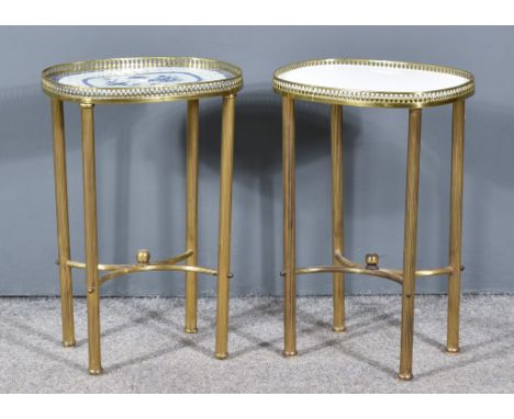 A Pair of Late 19th Century French Gilt Metal Mounted Oval Side Tables, both with pierced brass galleries, one inset with ova