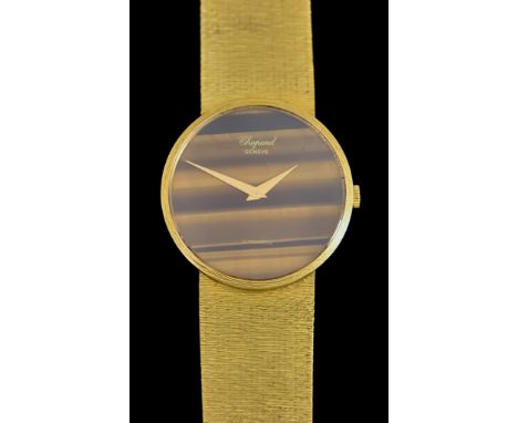  A Gentleman's Automatic Wristwatch, by Chopard, 18ct gold case, 32mm diameter, with integral 18ct gold bark effect bracelet,