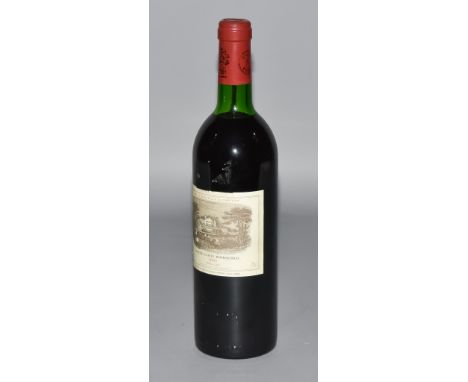 A Bottle of 1983 Chateau Lafite - Rothchild - (Pouillac)This item is from a deceased estate.&nbsp; It has been properly cella