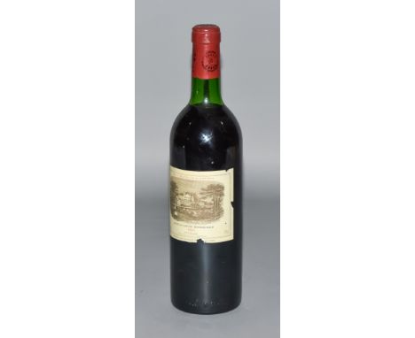 A Bottle of 1983 Chateau Lafite - Rothchild - (Pouillac)This item is from a deceased estate.&nbsp; It has been properly cella