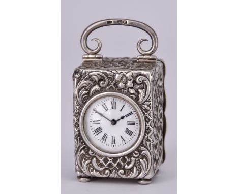 A Late Victorian Silver-Cased Desk Timepiece, the case by Charles Henry Dumenil, London 1899, the 1.25ins diameter white enam