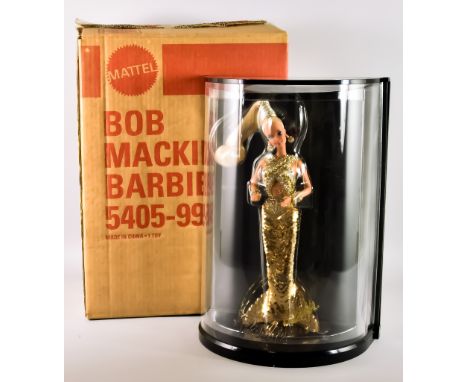 Mattel Barbie Doll, designed by Bob Mackie, this was the first Barbie to be designed by Bob Mackie, with stand, brochure, dis