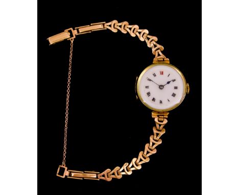 A Lady's Manual Wind Wristwatch,&nbsp;Early 20th Century,&nbsp;9ct gold case, 27mm diameter, white enamel dial with black Rom