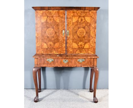A William and Mary Laburnum Oysterwood Veneered Cabinet, the whole veneered in segmented circular, semi-circular and quarter 