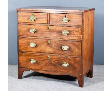 A Late Georgian Mahogany Chest with square edge to top, fitted two short and three long drawers, with shaped apron and bracke