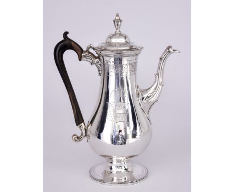 A George III Silver Baluster-Shaped Coffee Pot, by Thomas Chawner, London 1785, with bead mounts, the domed cover with urn pa
