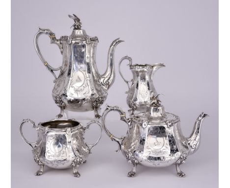 A Victorian Silver Four-Piece Tea and Coffee Service, by William Hunter, London 1852, the baluster panelled bodies engraved w