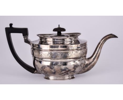 A George III Silver Oval Teapot, by Solomon Hougham, London 1805, with raised rim, moulded band to body engraved with interlo