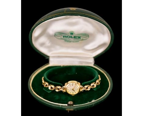 A Lady's Manual Wind Wristwatch, by Rolex, Model Precision,&nbsp;in 9ct gold case, 17mm diameter, silver dial with gold baton