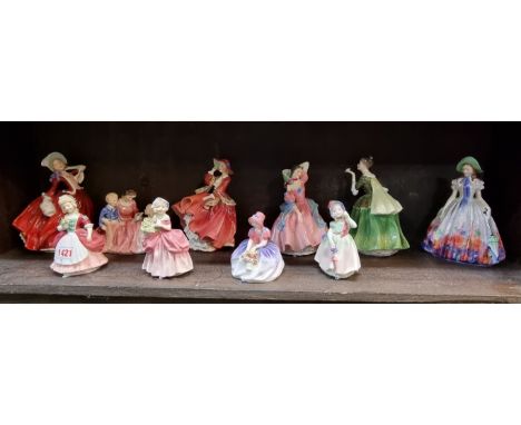 Ten Royal Doulton figures, to include 'Maytime', HN2113 and 'Easter Day', HN2039, (chips to bonnet of Cissie). (10) 