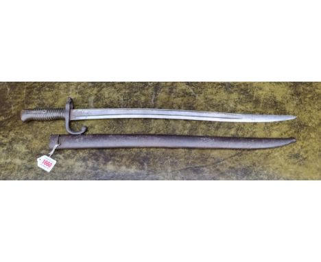 A French M1866 chassepot 'Yataghan' sword bayonet and steel scabbard, dated 1872.