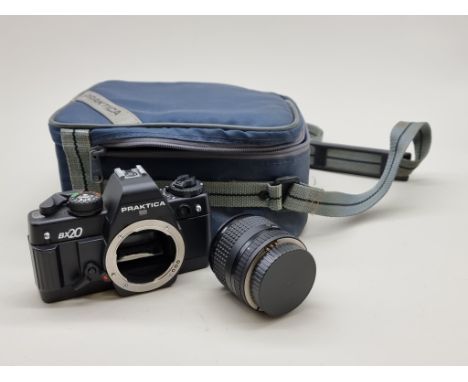 Cameras: a Praktica BX20 35mm, with three lenses, flash unit and instruction manual, in original case. 