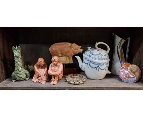 A mixed lot, to include a Wedgwood patent SYP teapot and cover; and a pair of terracotta figures by Barbara Stride. (8) 