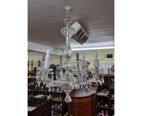 A large and impressive six branch ceiling light, 80cm high, (chip to one drip pan).&nbsp; By repute from Harrods.&nbsp; 