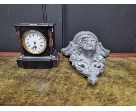 A slate and marble mantel clock, 20.5cm high, (s.d.); together with a composition wall bracket, 31cm high. (2) 