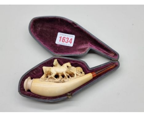 An antique carved meerschaum novelty pipe, (restoration to head of one horse), in fitted leather case. 