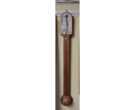 A reproduction mahogany stick barometer, with silvered dial. 