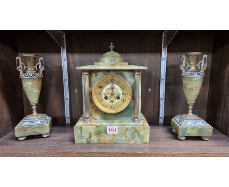 A matched late 19th century green onyx clock garniture,&nbsp;the clock dial inscribed 'R T Barfoot &amp; Co, Brighton', 29cm 