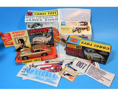 An originally boxed Corgi Toys James Bond Astin Martin DB5 No 261 from Goldfinger, with metallic gold paint, red interior, wi