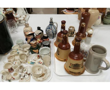 A selection of Wade whisky decanters; other spirit containers; a selection of toby jugs; crested china 