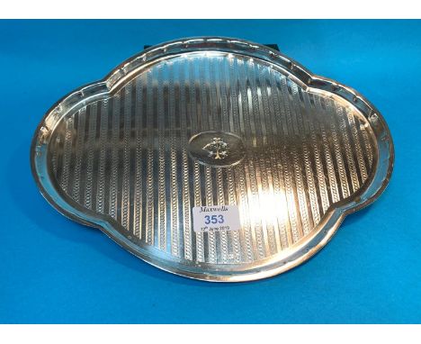A silver shaped oval dressing table tray, engine turned and monogrammed, Birmingham 1916, 10 oz 